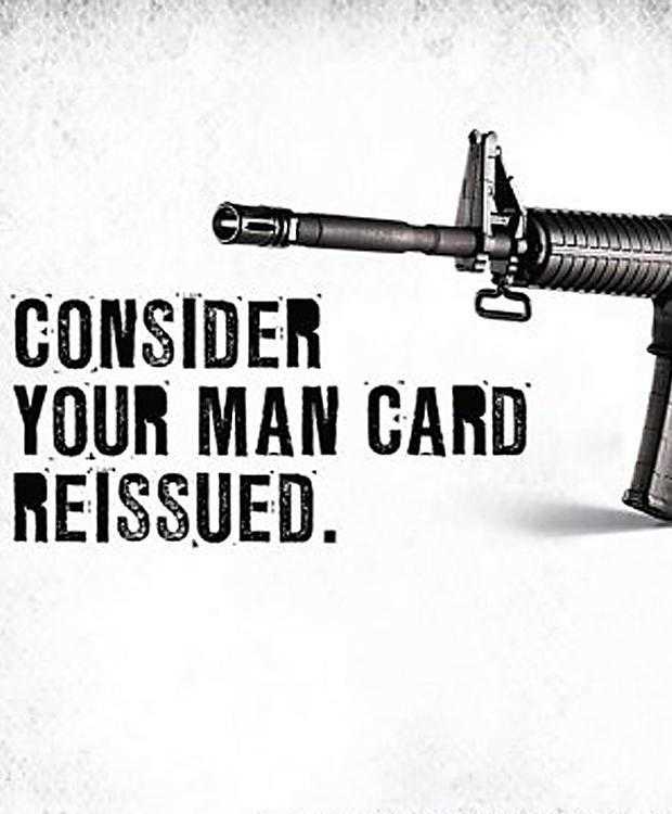 An advert for the Remington Bushmaster rifle. A picture of a gun with the words "Consider your man card reissued."