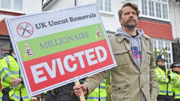 UK Uncut action, "evicting" millionaires and tax dodgers