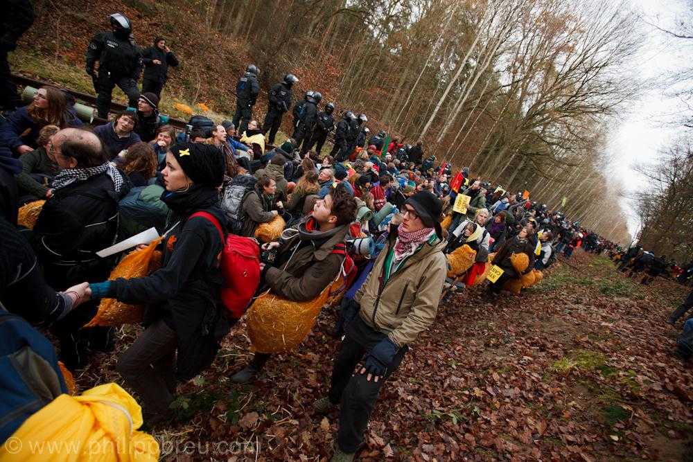 A large group of people attempt to blockade the Castor nuclear waste train